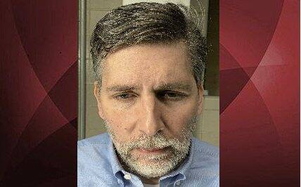 9036677_web1_ptr-EricGillespieMug-111225