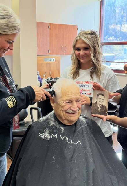 9036997_web1_naj-VeteranHaircut1-112025