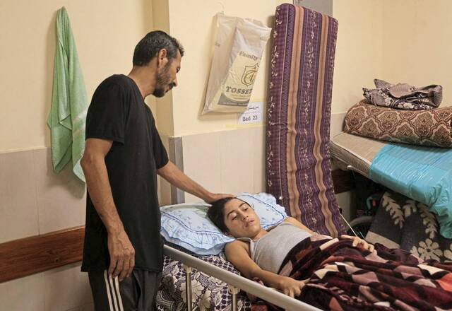 Gaza patients face a painful wait as hospitals sag under burden of cases