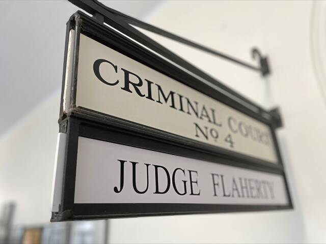 9039567_web1_PTR-Allegheny-County-Courthouse-Judge-Thomas-E-Flaherty-courtroom-sign-Pittsburgh-2025-FILE