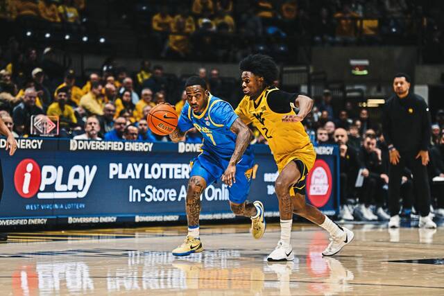 9043772_web1_gtr-PittWVU02-111425