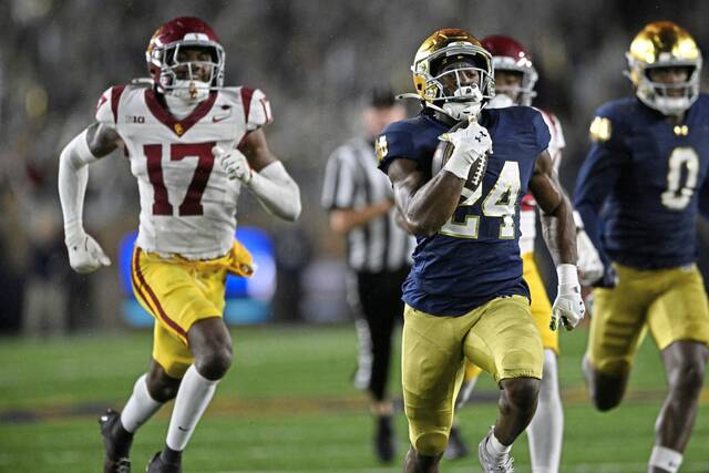 9044853_web1_AP25292129004573