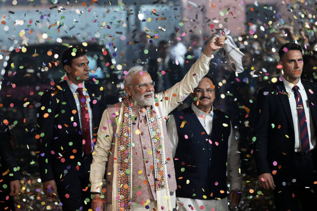 Modi's ruling coalition secures landslide victory in a key state election in India