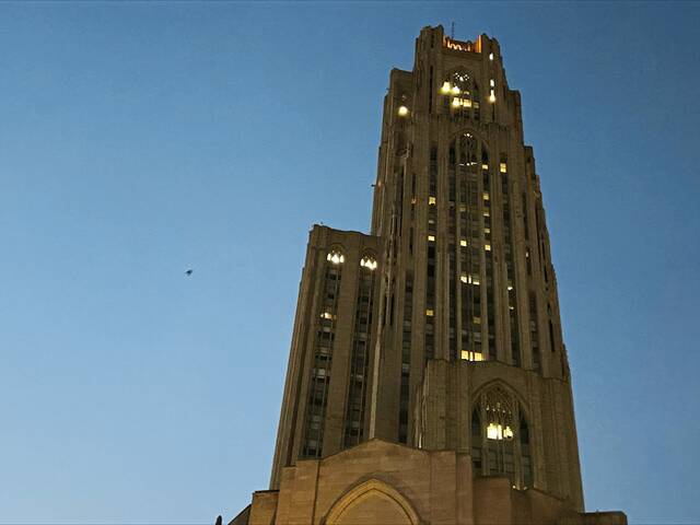 9048033_web1_PTR-University-of-Pittsburgh-Cathedral-of-Learning-dusk-Oct-2025