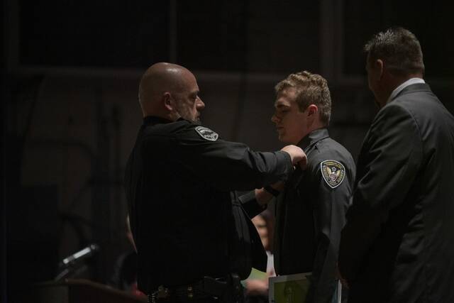 9053391_web1_gtr-lo-WCCCPoliceGraduation102