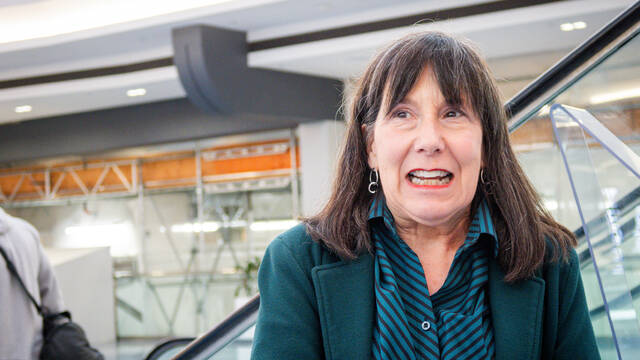 9055972_web1_ptr-DayOneAirport-111925-Lady-1