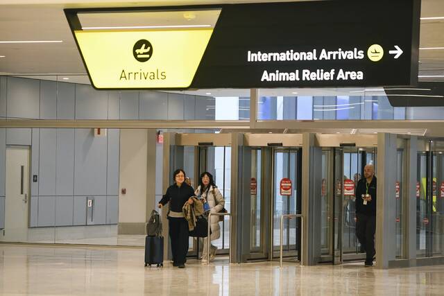 9055972_web1_ptr-dayoneairport009-111925