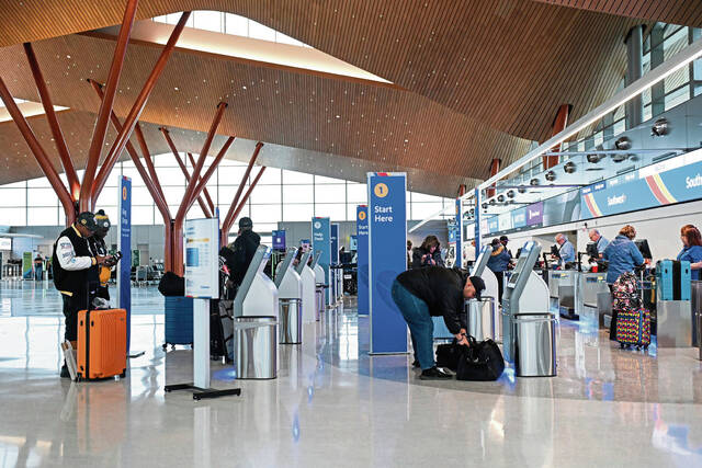 9057826_web1_ptr-dayoneairport018-111925