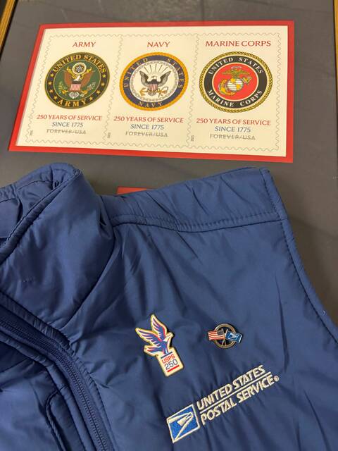 9059936_web1_naj-USPSstampsPins-121125