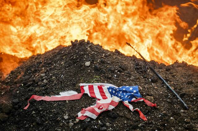 9060932_web1_gtr-lo-FlagBurnCeremony11