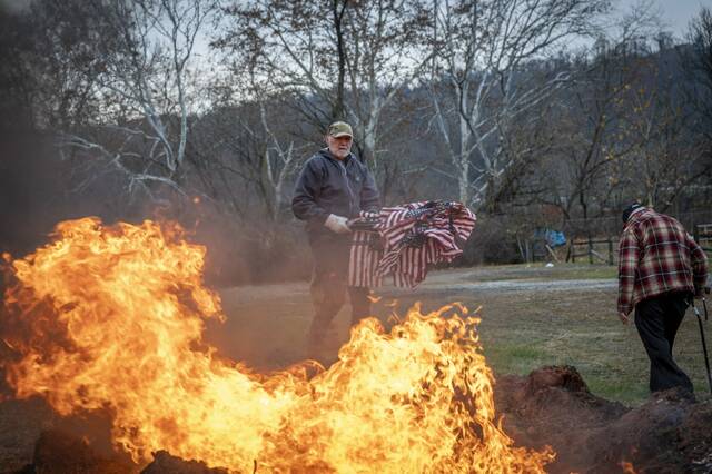 9060932_web1_gtr-lo-FlagBurnCeremony12