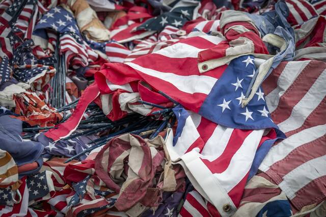 9060932_web1_gtr-lo-FlagBurnCeremony2