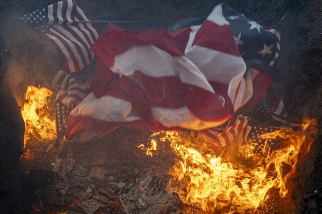 9060932_web1_gtr-lo-FlagBurnCeremony7