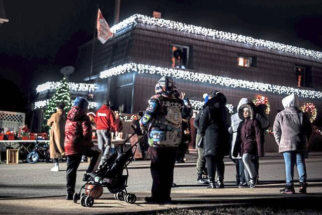 9060977_web1_vep-scenes-arnoldsantaletters3-120824