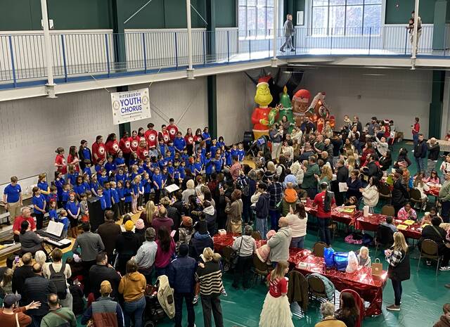 9063716_web1_pcj-HolidayInsideCrowd-121125