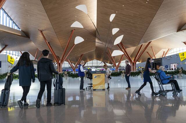 9074284_web1_ptr-holidaytravel12-112525