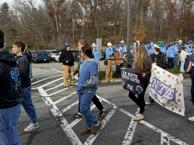 9080816_web1_naj-BeattieParadeMarch-121125