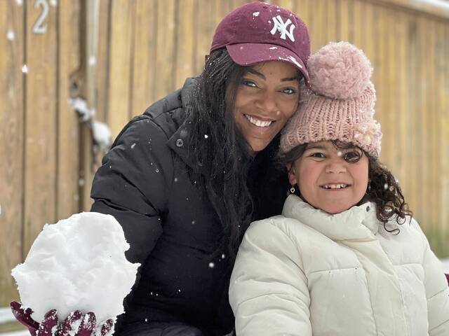 9092855_web1_her-lo-firstsnow-121125-2