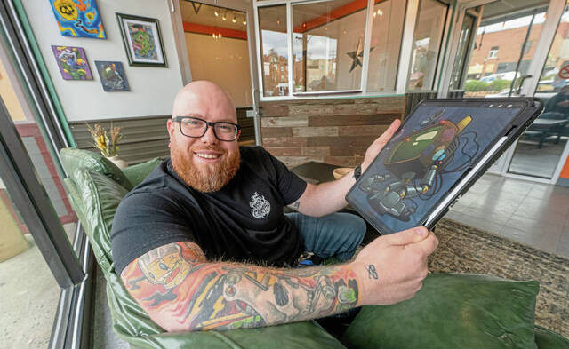 9093712_web1_vnd-tattoomanos100-111825