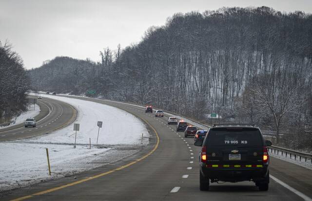 9093924_web1_gtr-GbgHoundFuneral7-120425