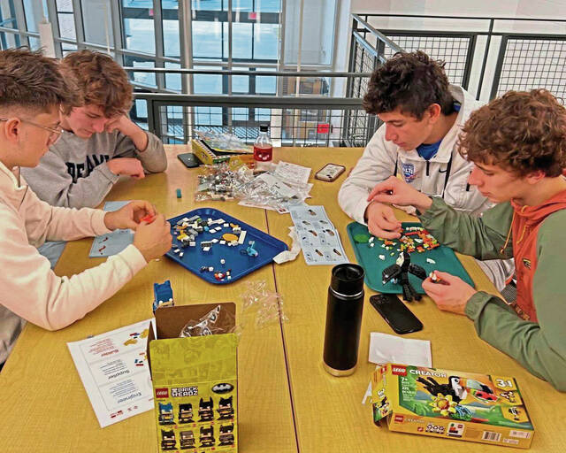 9094045_web1_sig-CVLegos2