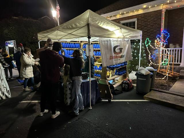 9096007_web1_sj-SparkIceSkatingTent-121125