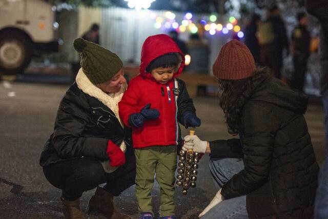 9100669_web1_her-LightUp13-121125