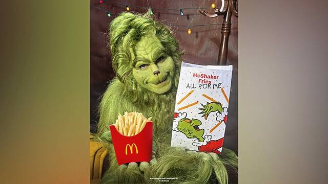 9117584_web1_ptr-GrinchMeal-121125-Grinch