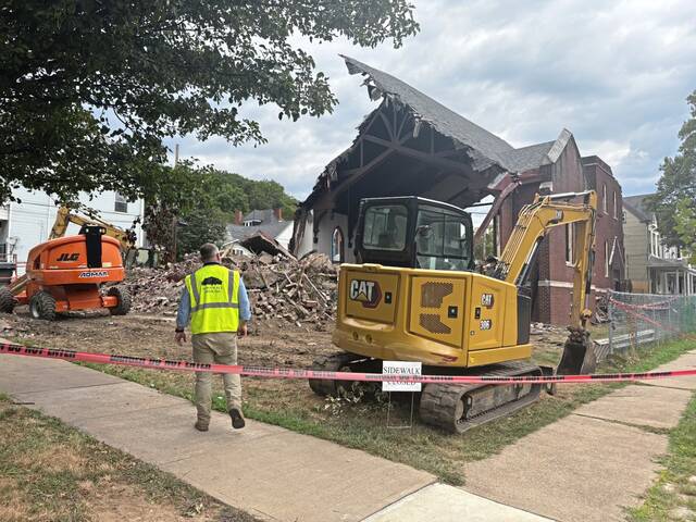 9119737_web1_her-aspchurchdemo-090425