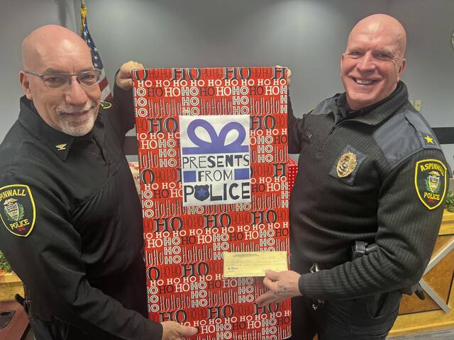 9119862_web1_her-policecharity-121825-2 9119862_web1_her-policecharity-121825-2