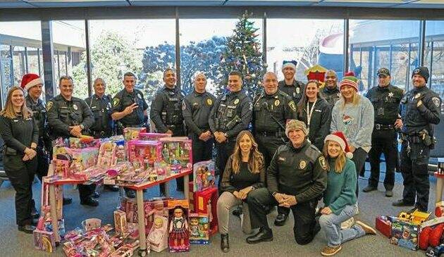 9119862_web1_her-policecharity-121825-3