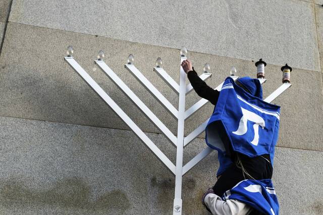 9130915_web1_ptr-lo-menorah2-122724