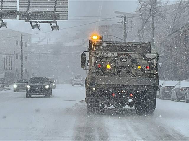 
			
				                                A truck scattering rock salt in Pittsburgh. (Justin Vellucci | TribLive)

			
		