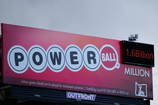 A billboard advertising the Powerball lottery is displayed, Monday, Dec. 22, 2025, in Portland, Ore. (AP)