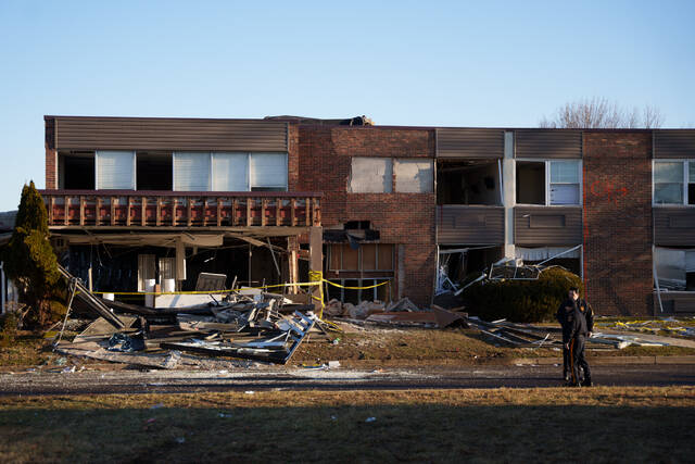 
			
				                                Investigators work Wednesday morning around the Bristol Health & Rehab Center and surrounding rubble after a gas explosion the day prior in Bristol, Pa. (AP)

			
		