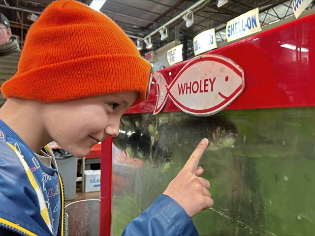 Feast of the 7 Fishes fuels Christmas Eve frenzy in Pittsburgh’s Strip District