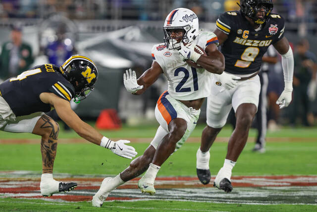No. 20 Virginia notches 1st 11-win season by beating No. 25 Missouri in Gator Bowl