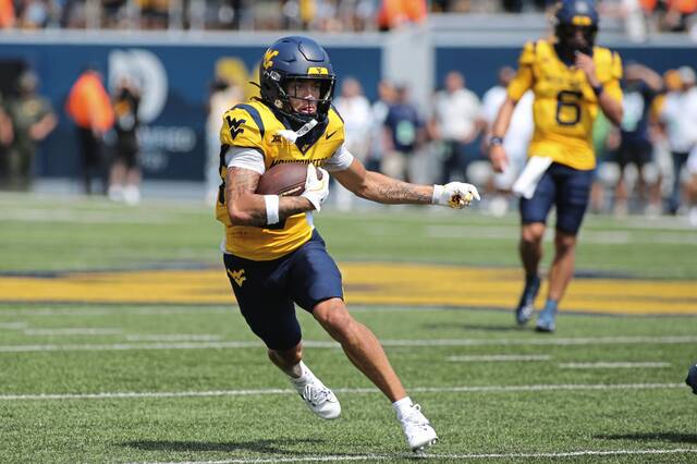 Former WPIAL football standout Gallagher transferring from WVU to Arizona