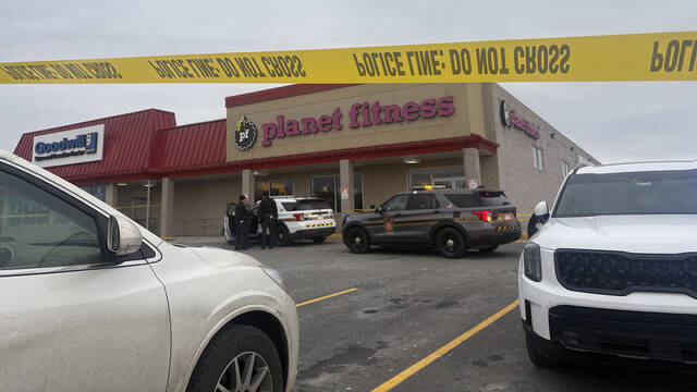 
			
				                                A suspect is in custody in connection with a shooting outside of the Plant Fitness in East Huntingdon. One man was shot and taken to a hospital. Police said bystanders helped render aid to the wounded man in the parking lot. (Renatta Signorini | TribLive)

			
		