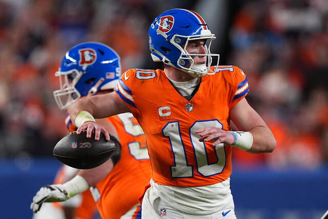 Broncos host 1st playoff game in a decade, face banged-up Bills