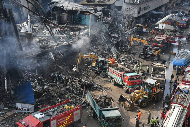 Karachi mall fire death toll rises to 23 as rescuers search for dozens missing