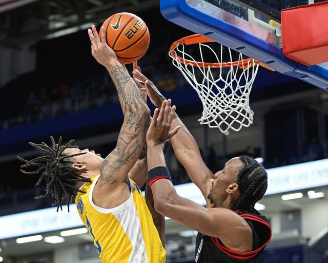 N.C. State pulls away late as hapless Pitt suffers 6th ACC loss in 7 games