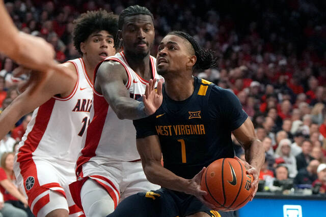 West Virginia can’t keep up with top-ranked, undefeated Arizona in blowout loss