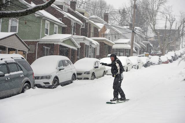 Storm shatters snowfall record as region braces for deep freeze, dangerous roads and widespread shutdowns
