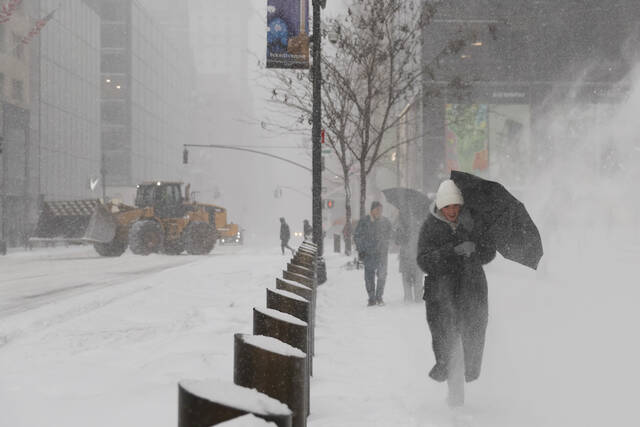 Paralyzing winter storms put a big chill on the economy, but how much?