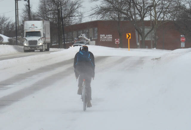 Bitter cold grips the eastern U.S. as winter storm deaths rise and power outages linger