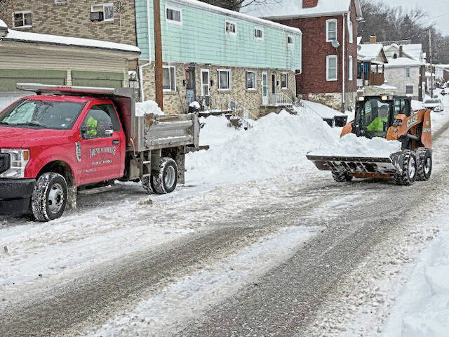 Communities deploy heavy machinery for snow removal