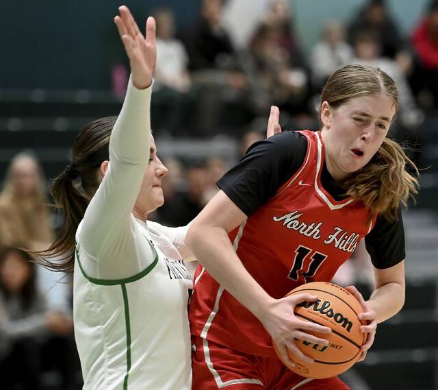 North Hills’ Delaney Amato grabs a rebound next to Pine-Richland’s Mia LeDonne during their game on Thursday, Jan. 29, 2026, in Pine. (Christopher Horner | TribLive)
