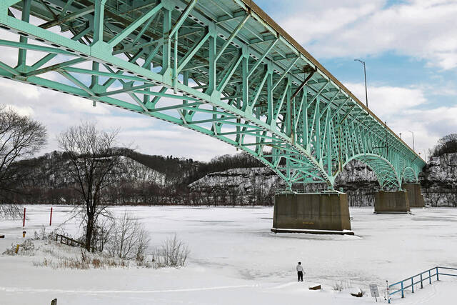 
			
				                                A person takes in the frozen Allegheny River under the Tarentum Bridge on Thursday<ins>,</ins><ins> Jan. 29, </ins><ins>2026</ins>. (Kristina Serafini | TribLive)

			
		