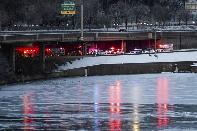 Car veers into Monongahela River off Parkway; 1 person taken to hospital